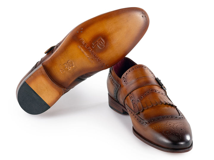 Sophisticated men's brown leather monkstrap shoes with elegant buckle and kiltie