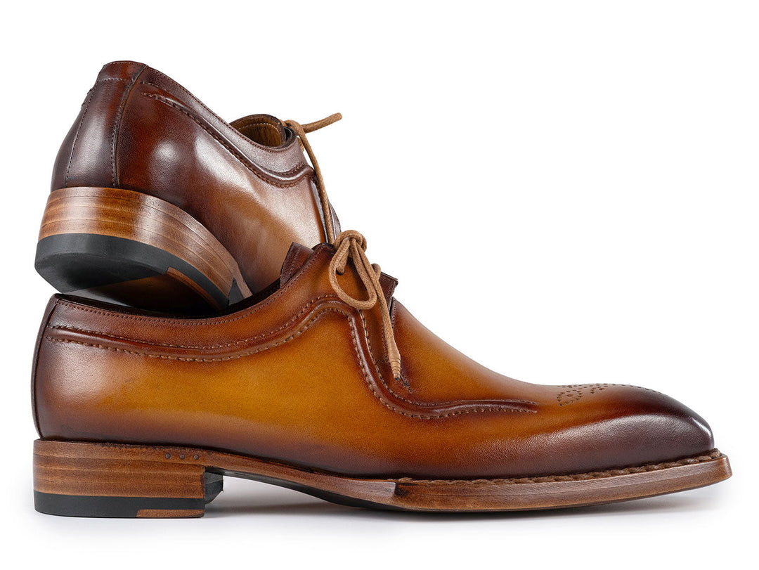 Elegant and classic men's derby shoes in camel brown leather with intricate craftsmanship