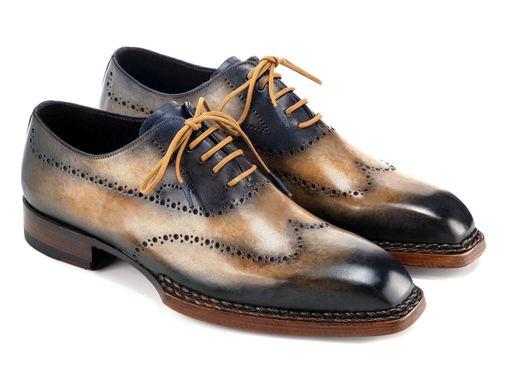 Handcrafted Paul Parkman Goodyear Welted Men's Wingtip Oxfords in camel and navy leather