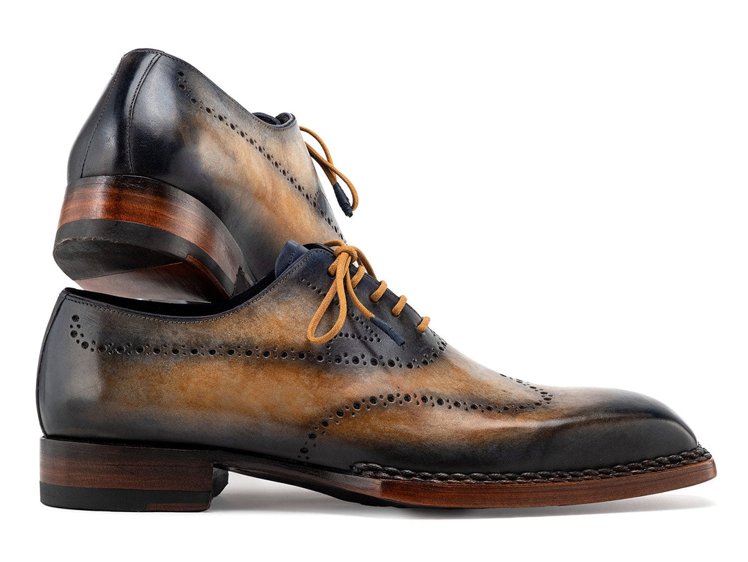 Handcrafted Paul Parkman Goodyear Welted Men's Wingtip Oxfords in Camel & Navy color combination, featuring exquisite detailing and premium craftsmanship