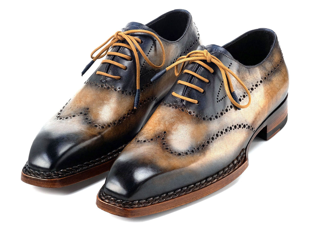 Paul Parkman Goodyear Welted Men's Wingtip Oxfords in Camel and Navy, a stylish and durable footwear option for the modern gentleman