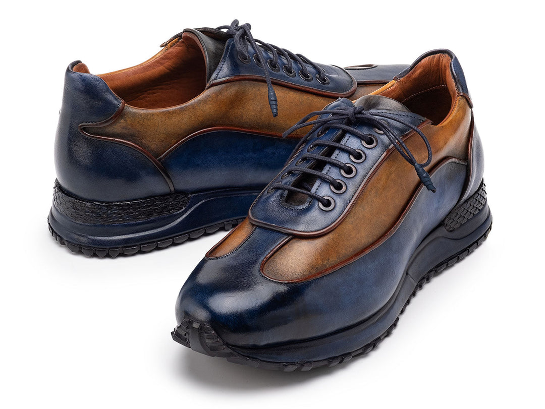 A pair of Paul Parkman Men's Blue & Camel Patina Leather Sneakers with a stylish design