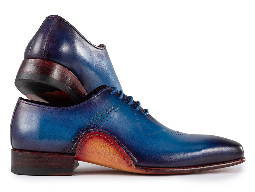 High-quality leather oxfords with intricate hand-painted patterns in shades of blue